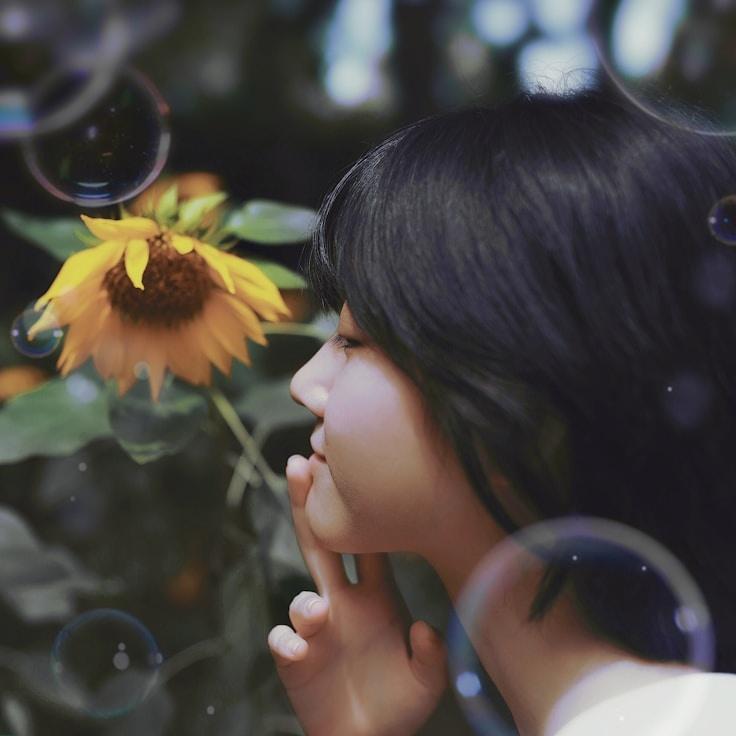 Kaveri Mehta, Lead Design Curator at EmberFieldNook, reviewing corporate floral arrangements